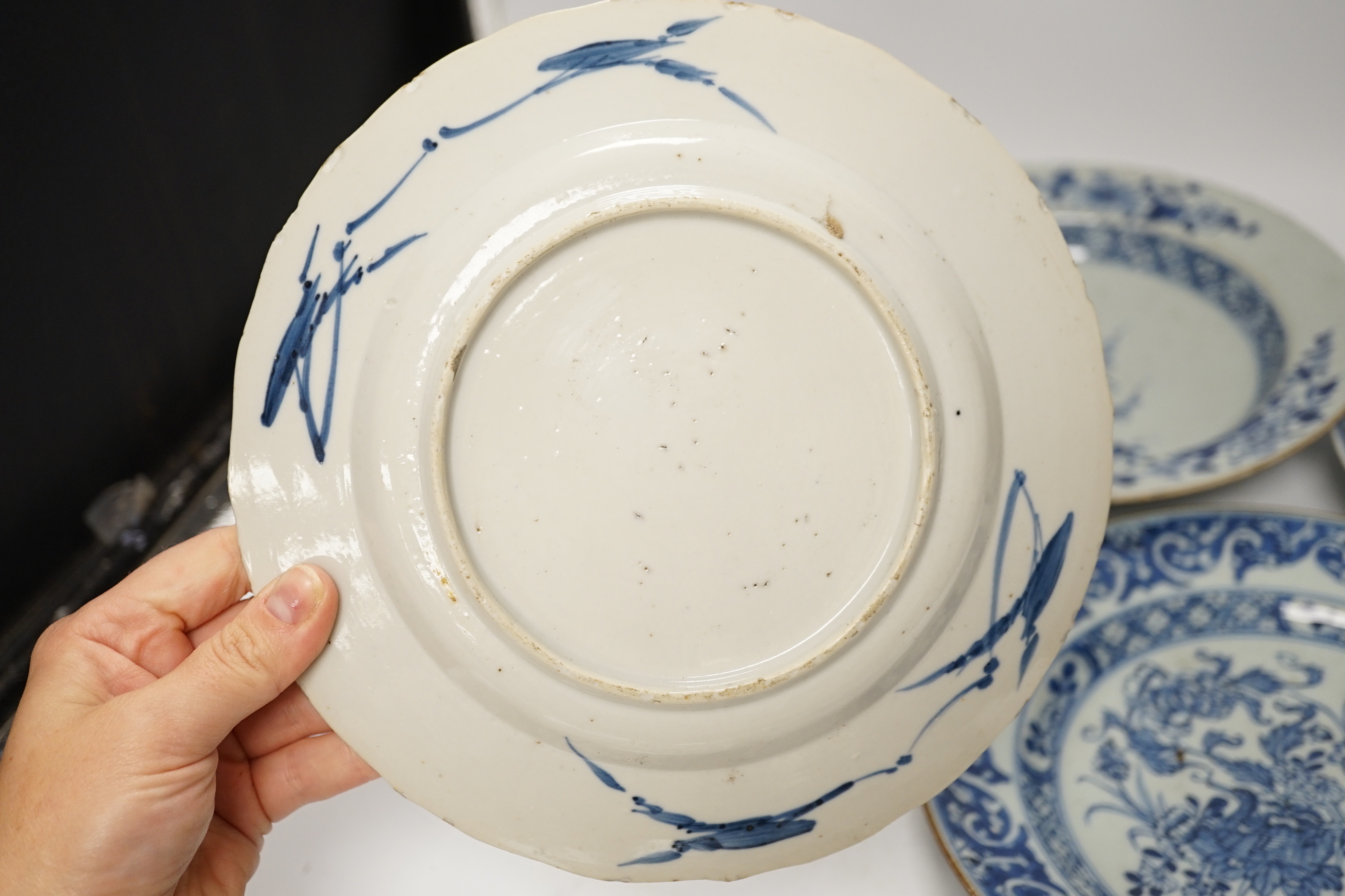 Six 18th century Chinese blue and white dishes and plates, largest 23cm diameter